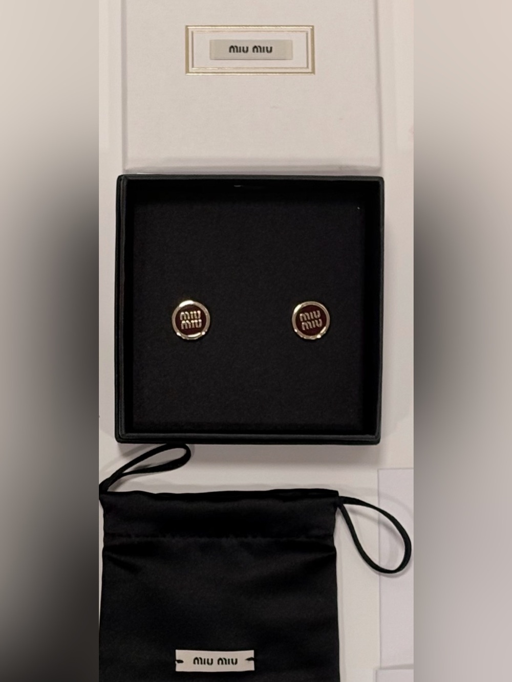 Authentic Miu Miu enameled earrings in Amaranth red Preowned